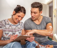 Couple Making Plans in their New Home